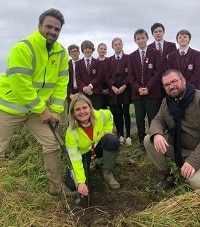 County firm puts down roots through tree planting project